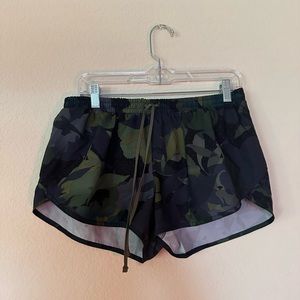 green workout shorts